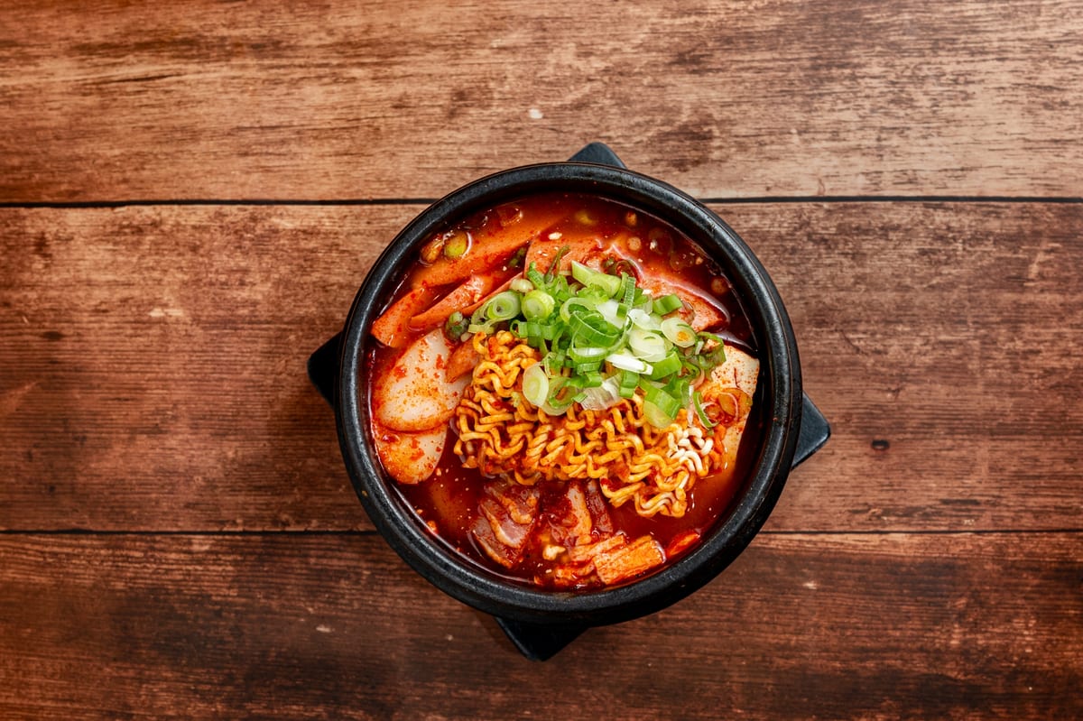 Army stew, bubbling with ramyun and kimchi